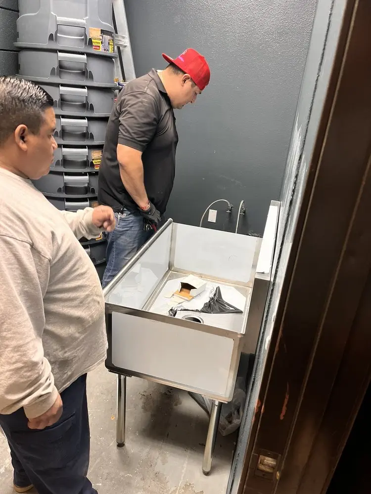 Commercial plumbing and sink installation in Kings Grant